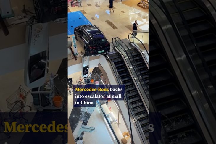 Display Mercedes-Benz backs into escalator at Chinese mall