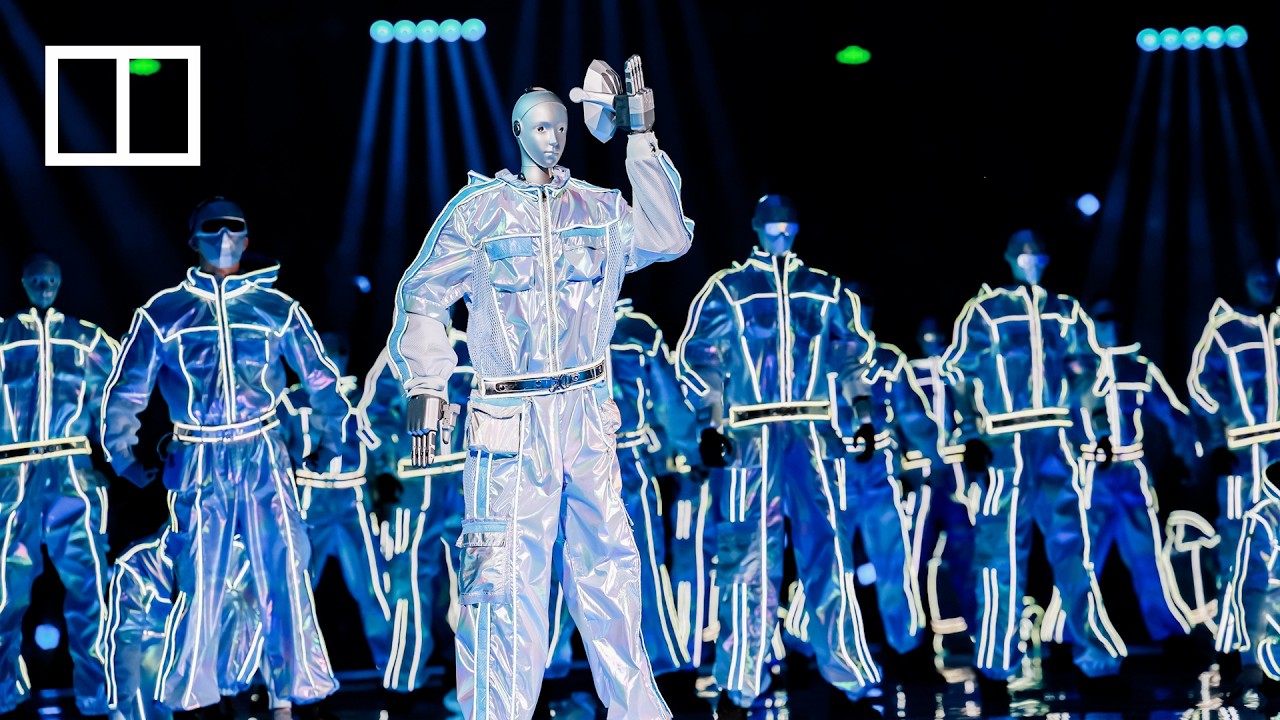 Full-size humanoid robots danced gracefully with human partners